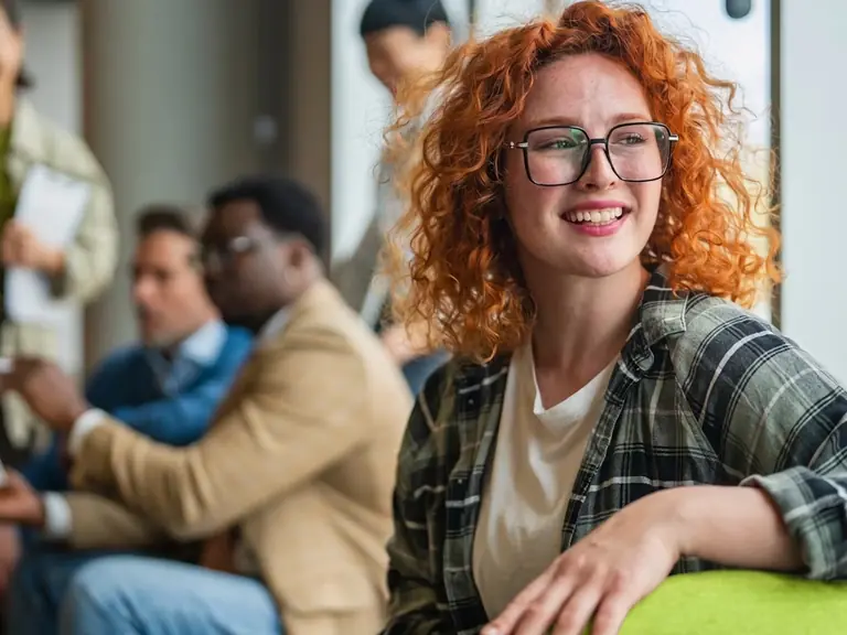 A student smiling during a group session