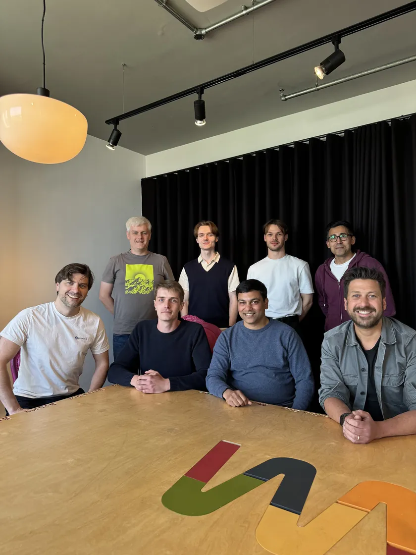 The Potentially team around the table in the London office